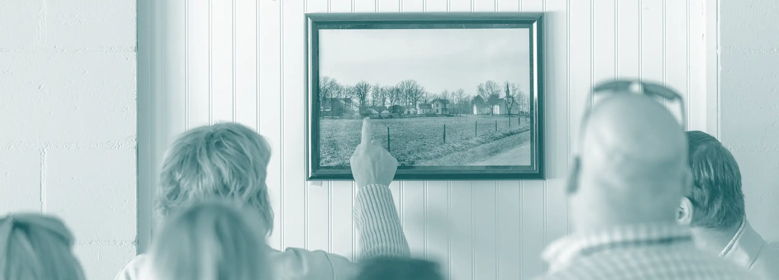 Leadership Spencer County students observing a historical photo.