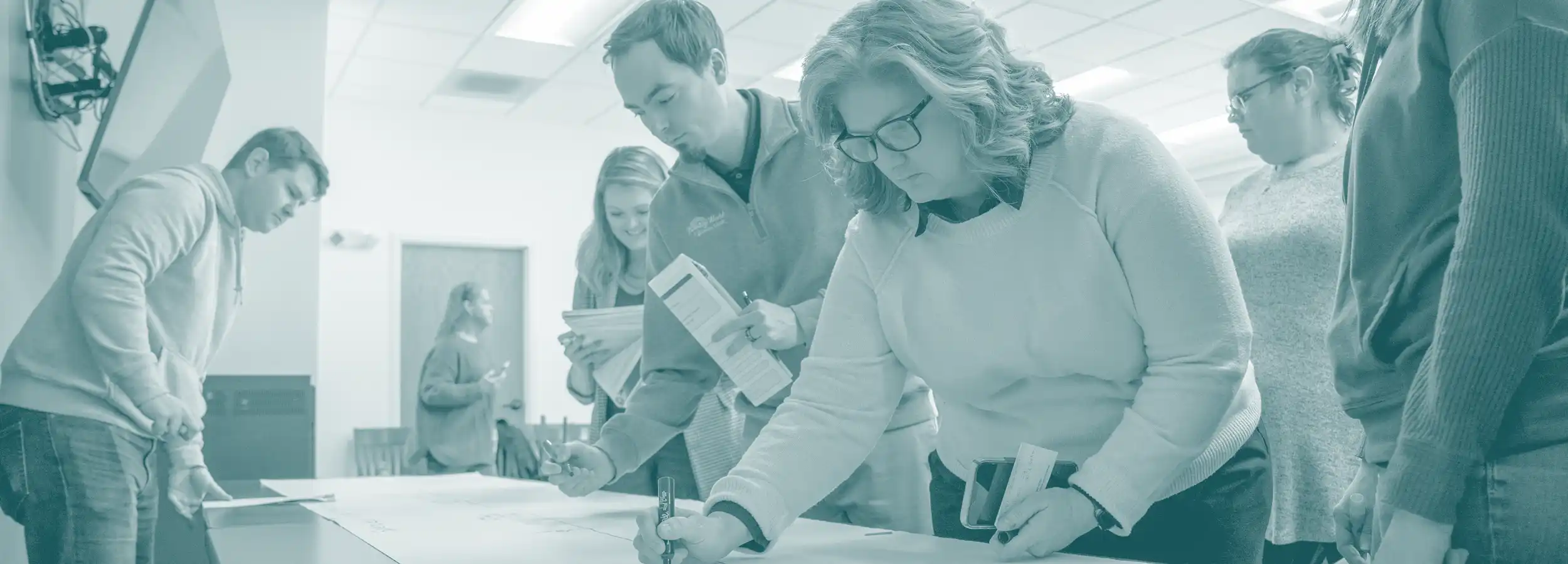 Leadership Spencer County students working on a class project.